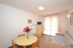 Sunny apartment right by the beach